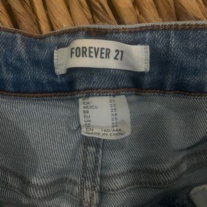 Girls distressed jeans.